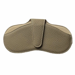 Portable khaki lychee grain leather sunglasses case with white contrast stitching
