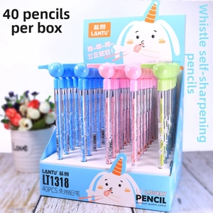 Bulk display of creative whistle cap pencils with cartoon rabbit prints in a storage box