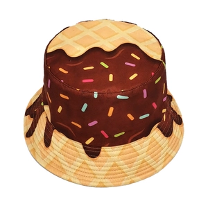 Detail of creative doughnut pattern on a reversible bucket hat with chocolate glaze graphics