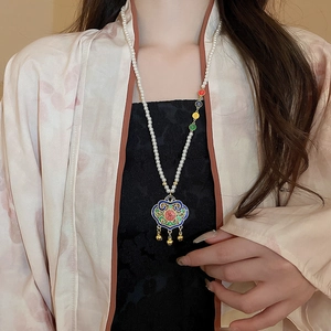 Modern Ruyi Emerald lock pearl necklace with colorful enamel beads shown on a model