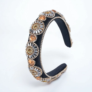 Baroque black sponge headband with intricate gold metal inlay and sparkling rhinestones