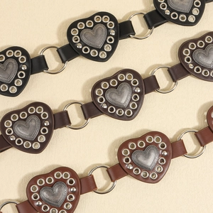 Western retro waist belts in black and brown with heart studs and metal ring accents