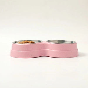 Pink double stainless steel pet bowls for feeding and drinking with splash-proof base