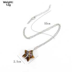 Detail view of tiger eye star pendant with wire tree of life and size measurements
