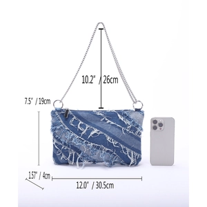 Detailed size chart of denim shoulder bag with dimensions and phone size comparison