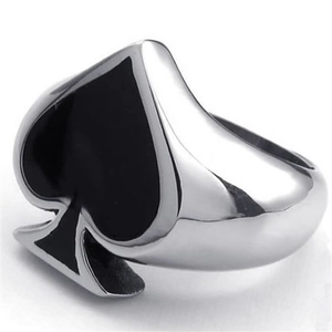 Polished stainless steel ace of spades ring with black enamel inlay on white background