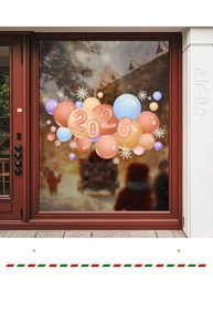 Detail of Christmas window stickers with festive 2026 balloons and white snowflake patterns