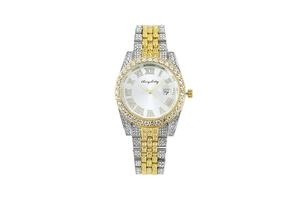 Detail of crystal-encrusted roman numeral watch dial with calendar window and fluted bezel
