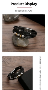 Detail of multi-layered black braided leather bracelet with stainless steel lucky beads