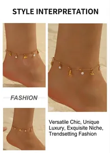 Close-up of beach anklet featuring pearls and gold marine charms like starfish and turtles
