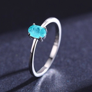 Minimalist S925 sterling silver ring with oval Paraiba tourmaline stone on dark base