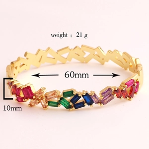 Detail view of 18k gold plated rainbow bracelet with dimensions 60mm diameter and 10mm width