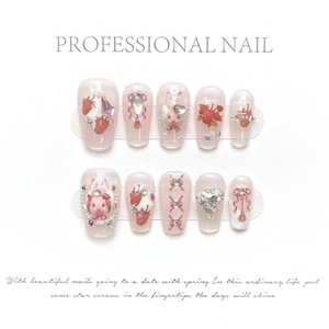 Detail of handmade long oval press-on nails with 3D pink bows and rabbit nail art