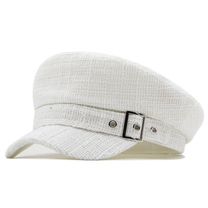 White tweed newsboy cap for women with textured plaid pattern and metal buckle detail
