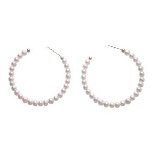 Elegant geometric circular earrings with white faux pearls and silver needles