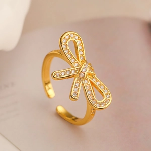 Exquisite 18K gold-plated bow ring for women featuring sparkling cubic zirconia stones