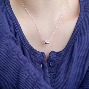 Minimalist 925 sterling silver necklace featuring an irregular geometric stone pendant