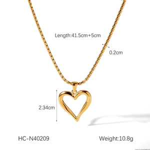 Detailed specs of gold hollow heart pendant necklace showing chain length and weight