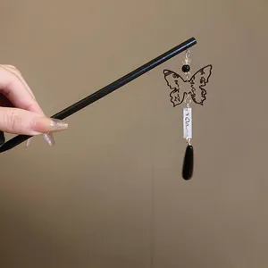 New Chinese style black hair pin featuring a butterfly tassel and elegant waterdrop pendant