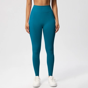 Detail der nahtlosen High-Waist Kompressions-Leggings in dunklem Petrol mit breitem Bund