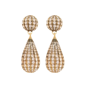 Vintage gold teardrop earrings with crystals and striped texture on white background