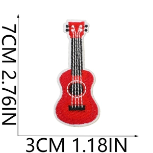 Macro detail of red guitar embroidery patch with precise dimensions 7cm by 3cm