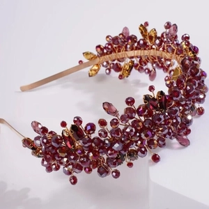 Luxurious handmade fuchsia crystal bridal headband with gold leaf wire wrapping