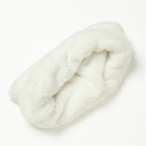 Detailed close-up of soft white faux rabbit fur texture on a plush neck warmer