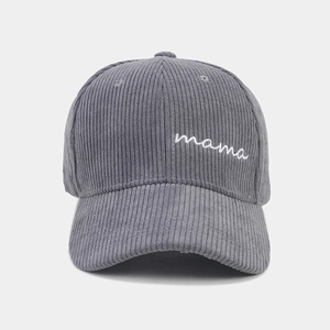 Detailed close-up of mama embroidery on grey corduroy baseball cap for women
