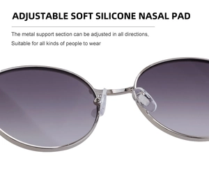 Detail of adjustable soft silicone nose pads on silver metal round sunglasses