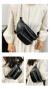 Multiple views of a black chain chest bag showing front, side and back on white dress