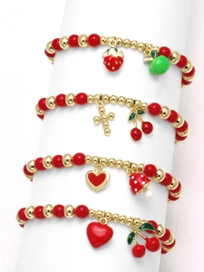Detail of four-piece fruit charm bracelets with cherry, strawberry and mushroom pendants