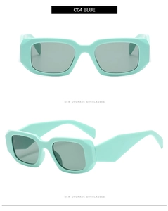 Detail view of light blue polygon sunglasses with thick temples and dark grey lenses