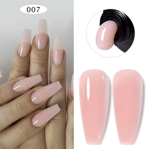 Detail view of 007 pink solid extension nail gel on long coffin shaped nails