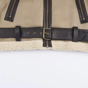 Detail of faux suede jacket showing waist belt, metal buckle, and warm shearling lining