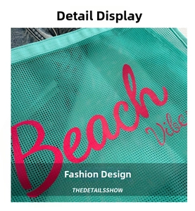 Detailed macro view of the breathable green mesh fabric and pink Beach Vibes print