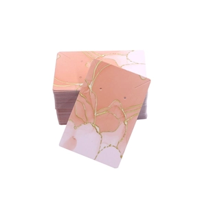 Pink marble and gold foil jewelry display card for earrings and necklaces packaging