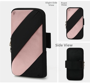 Detail view of pink and black striped sports arm bag with breathable mesh back