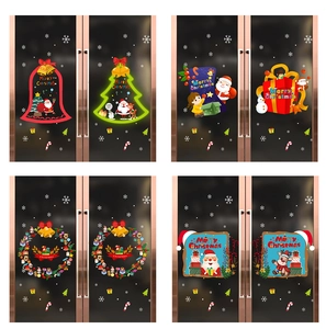 Detail of Christmas PVC static stickers with Santa, tree, and reindeer on glass