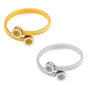 Bracelet ajustable au design évidé avec strass brillants en finitions dorée et argentée