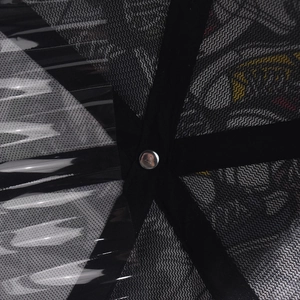 Macro view of the internal mesh design and reinforced stitching on the black baseball cap