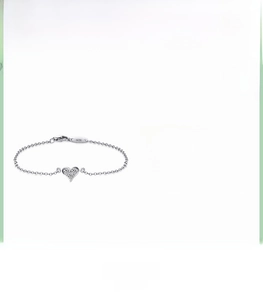 Detail of 925 sterling silver heart bracelet with sparkling cubic zirconia inlay