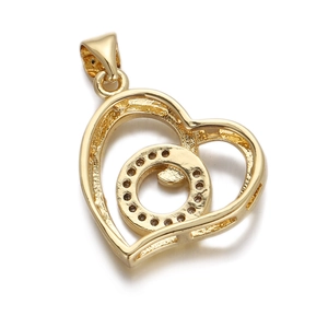 Detail of 18K gold-plated heart pendant with micro-set zircons on a white background