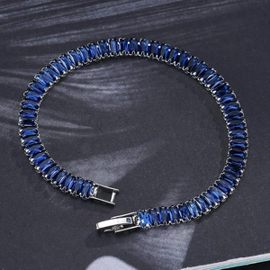 Elegant gun black bracelet featuring rectangular deep blue zircon stones with metal clasp