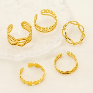 5-piece gold geometric ring set featuring heart and hollow chain designs for women