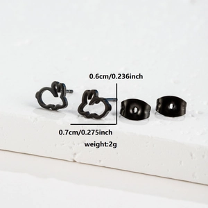 Detail showing dimensions of black rabbit hollow stud earrings measuring 0.6cm by 0.7cm