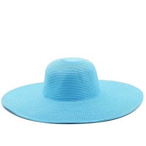 Detailed texture of 13cm wide brim straw sun hat in bright blue with woven design