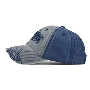 Distressed cotton baseball cap with New York embroidery in a blue grey contrast design