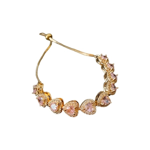Double-layered pink heart zircon bracelet in gold finish with adjustable slider