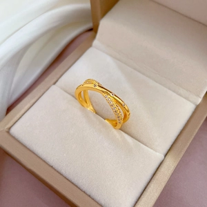 Adjustable gold plated criss-cross ring with micro-paved rhinestones on silk fabric